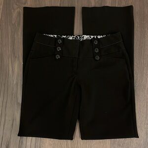 Awesome black dress pants - size 2 with adorable button details. Boot cut.